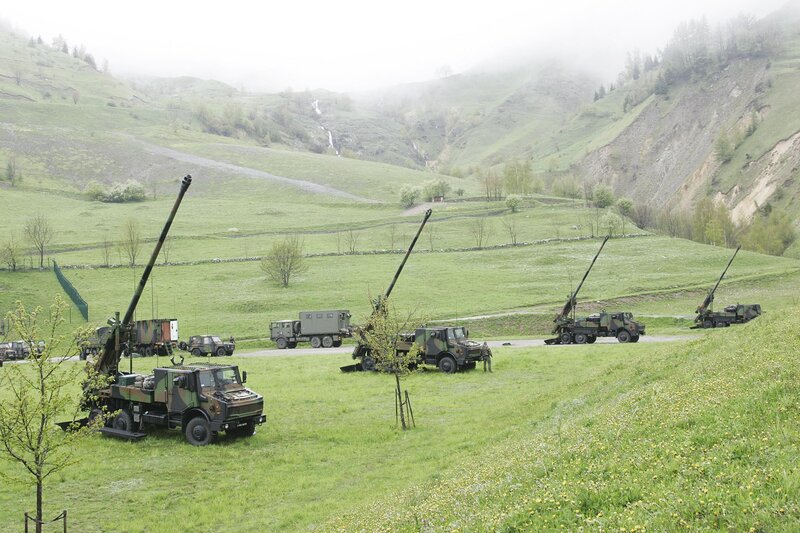 Military vehicles in a valley