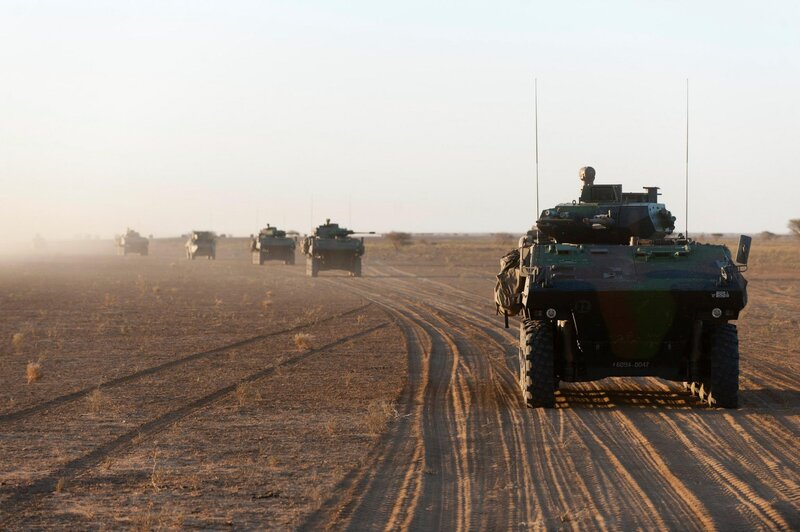 Military Vehicles in Desert — Brown, Dramatic, Afternoon, Photograph, Armored Vehicles, Dirt Road