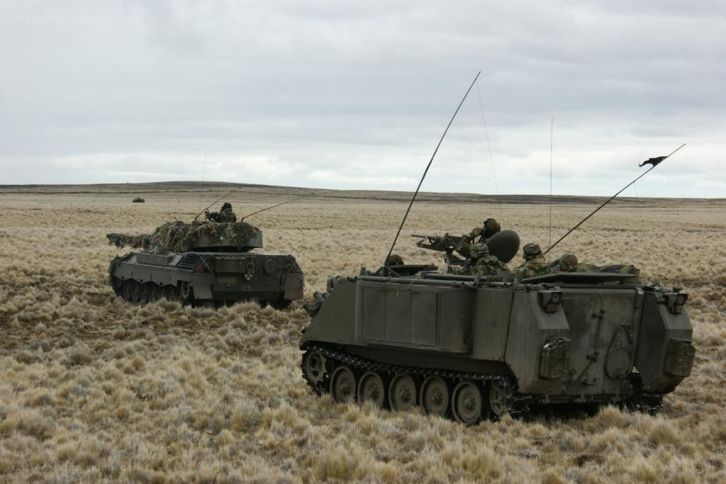 Military vehicles in field exercise