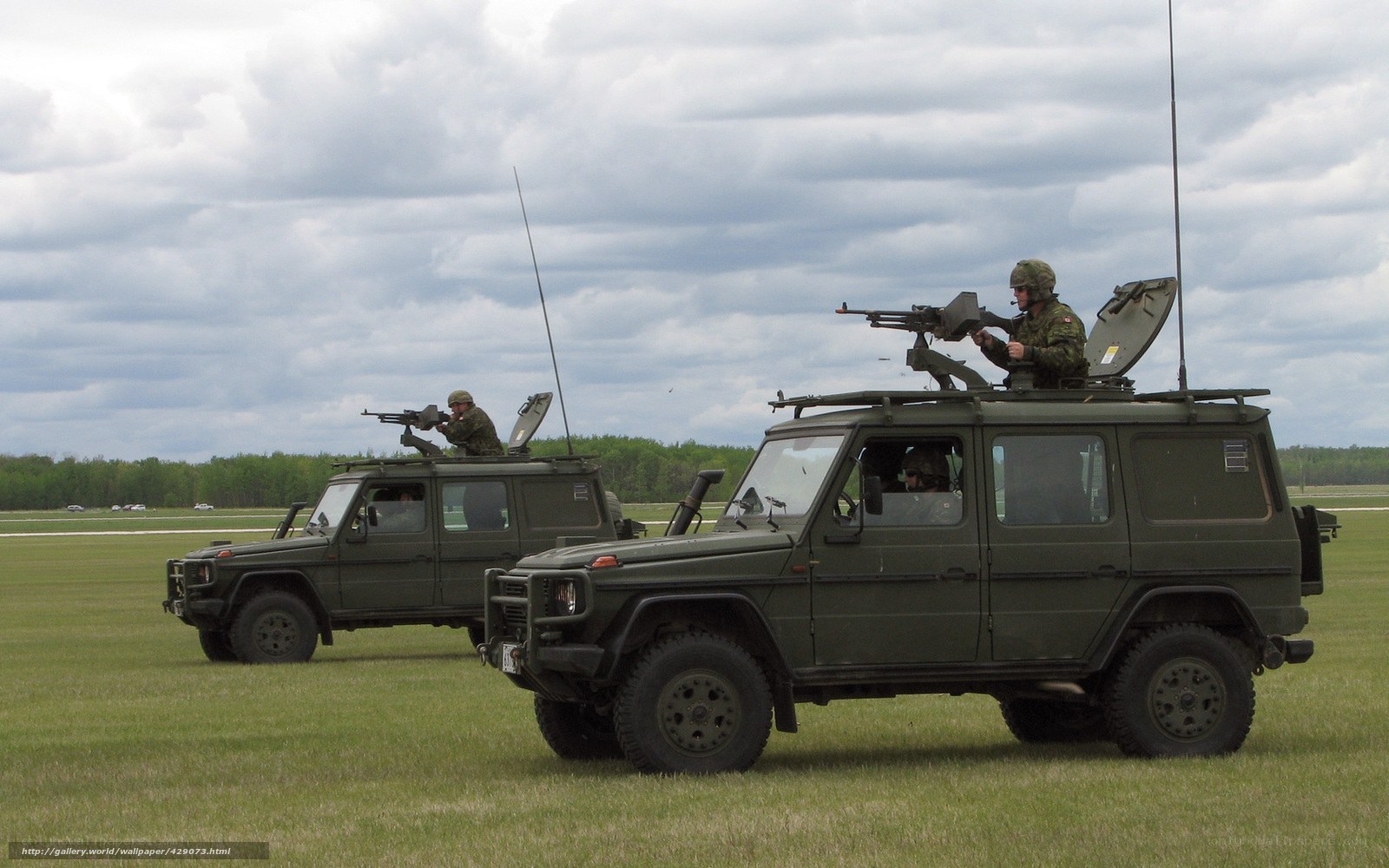 Military vehicles in field exercise