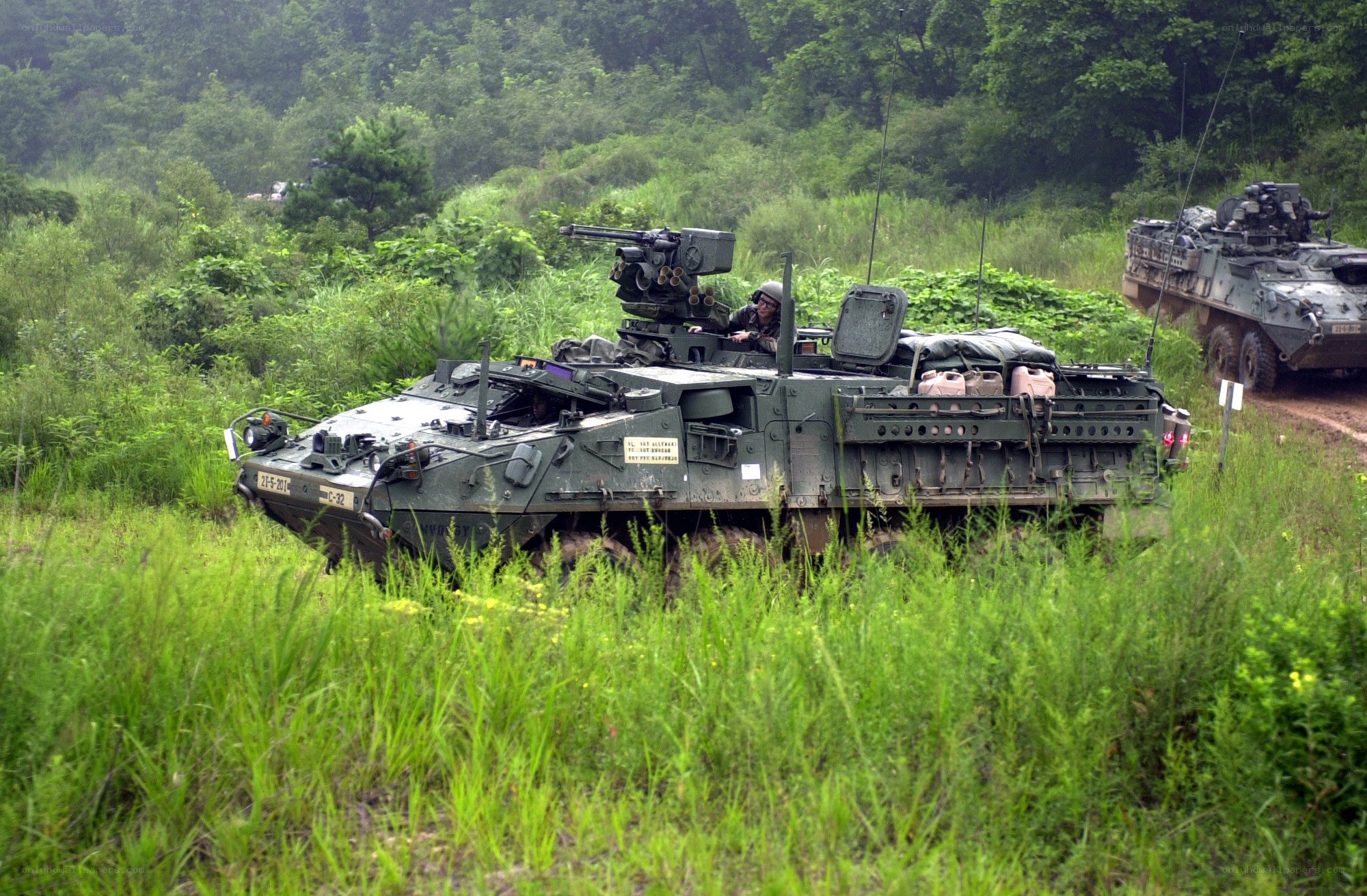 Military vehicles in field training
