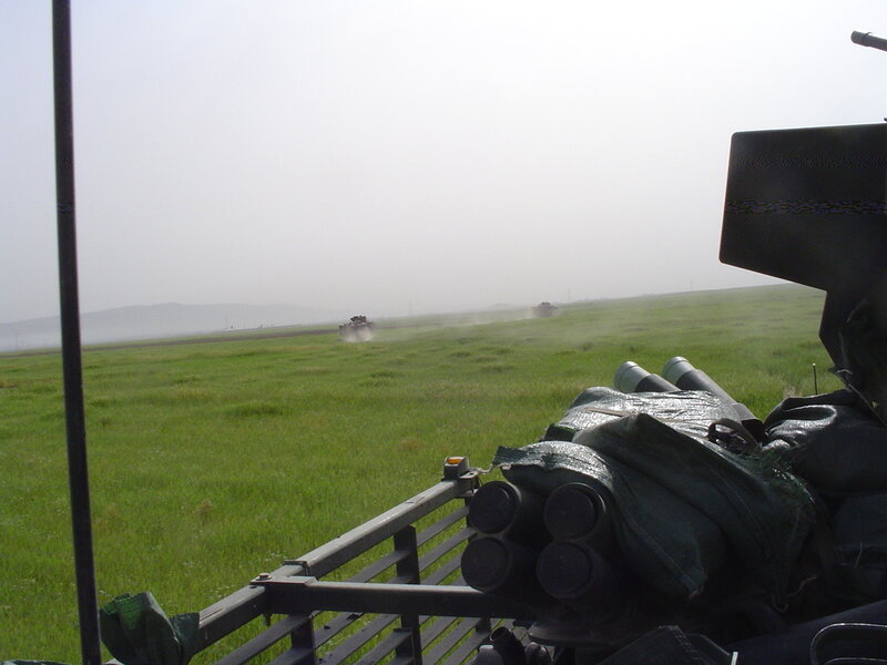 Military vehicles on a field