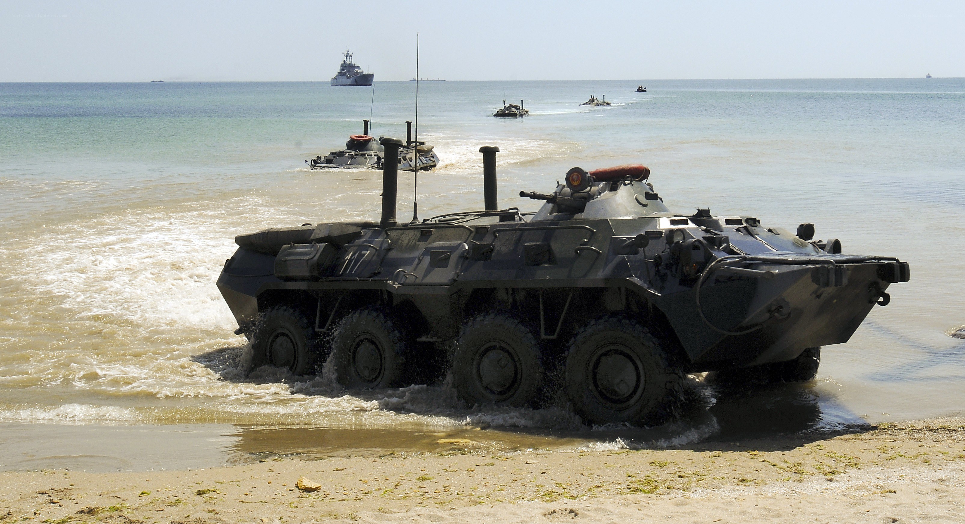Military vehicles on beach