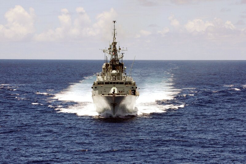 Military Warship at Sea — Blue