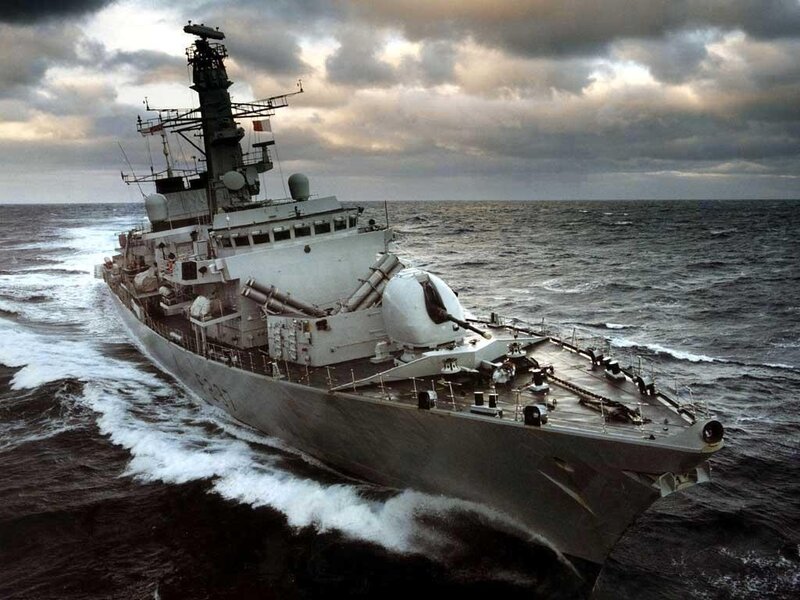 Military Warship at Sea — Gray, Dramatic, Afternoon, Photograph