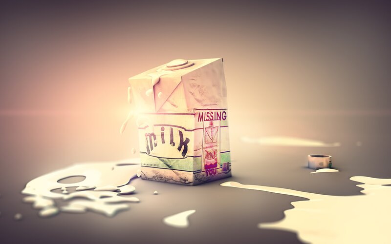 Milk carton with spilled milk