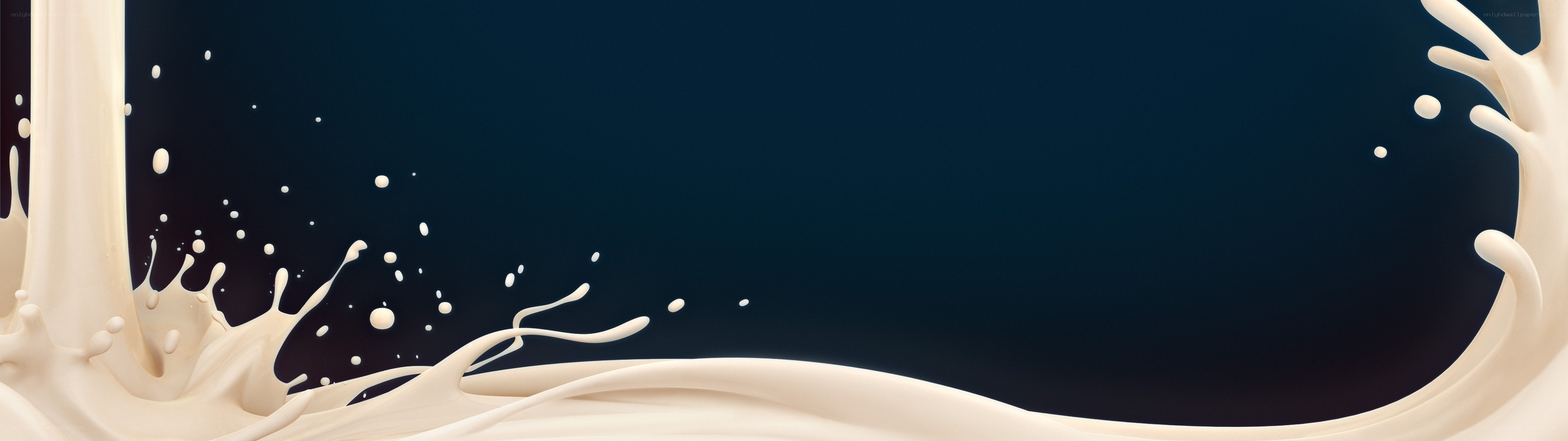 milk splash on dark background