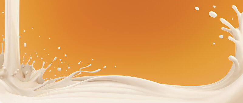 milk splash on orange background