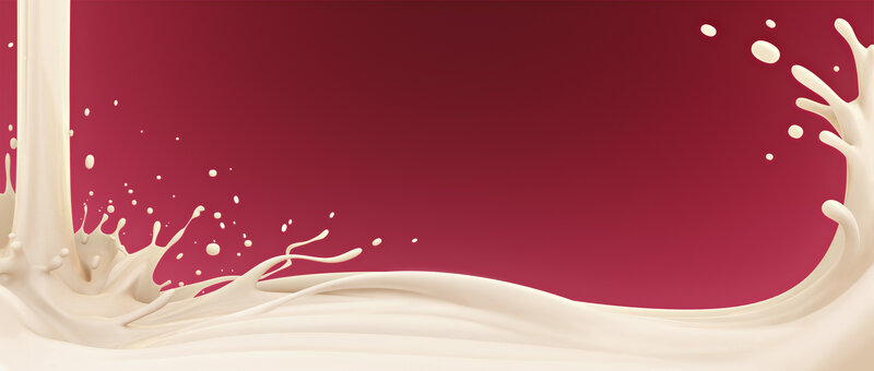 milk splash on red background