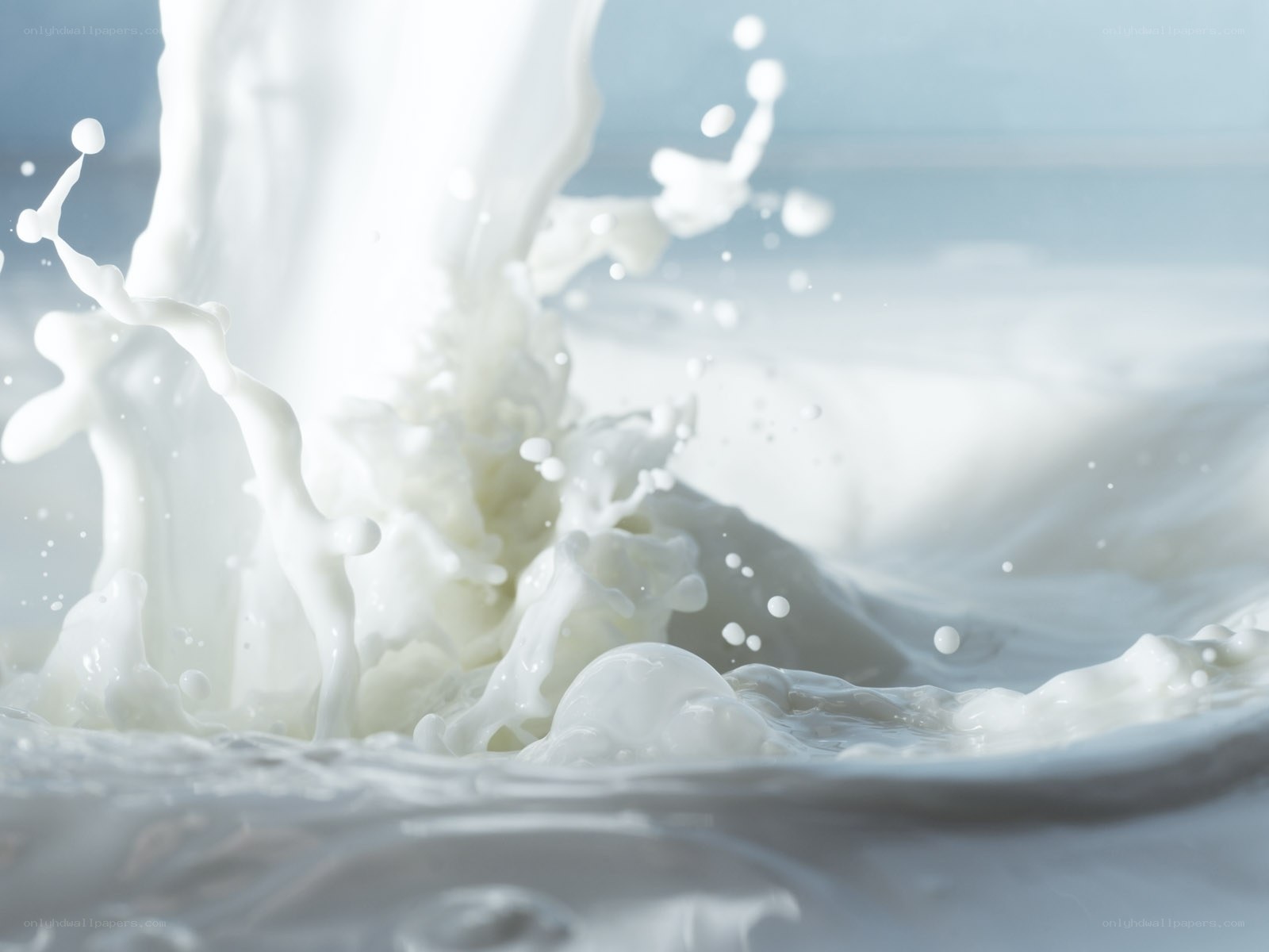 milk splashing in slow motion