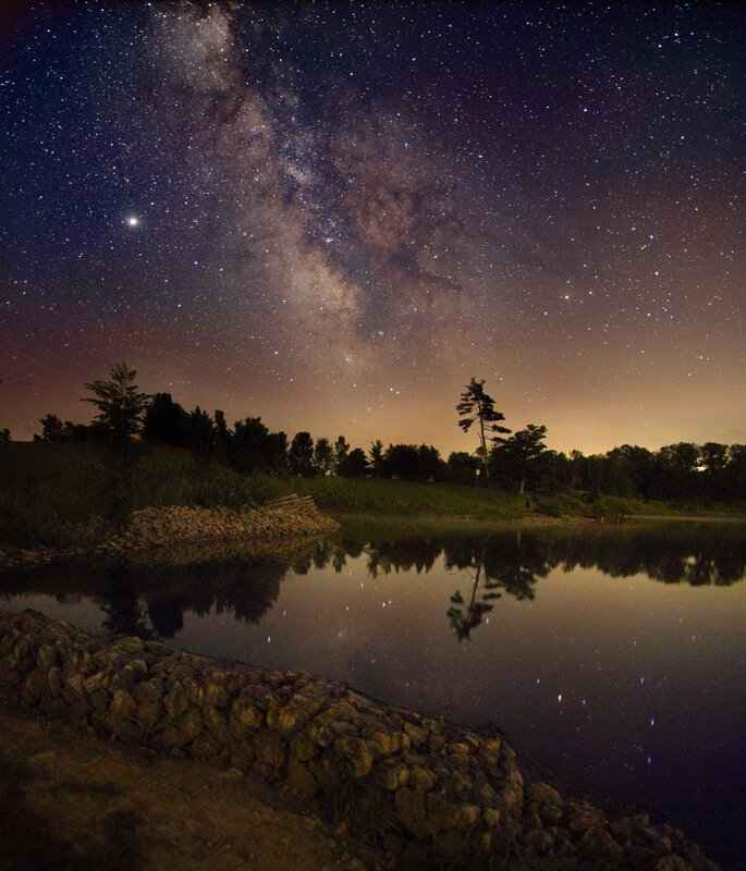 Milky Way over a calm lake