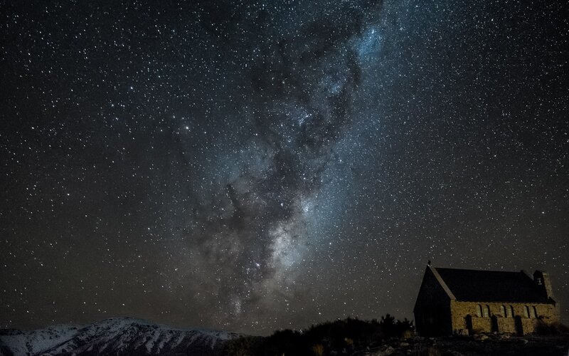 Milky Way over church at night