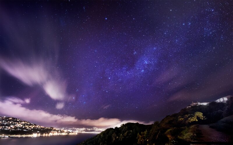 Milky Way over Coastal City