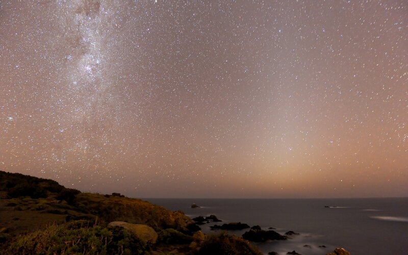 Milky Way over coastal cliffs
