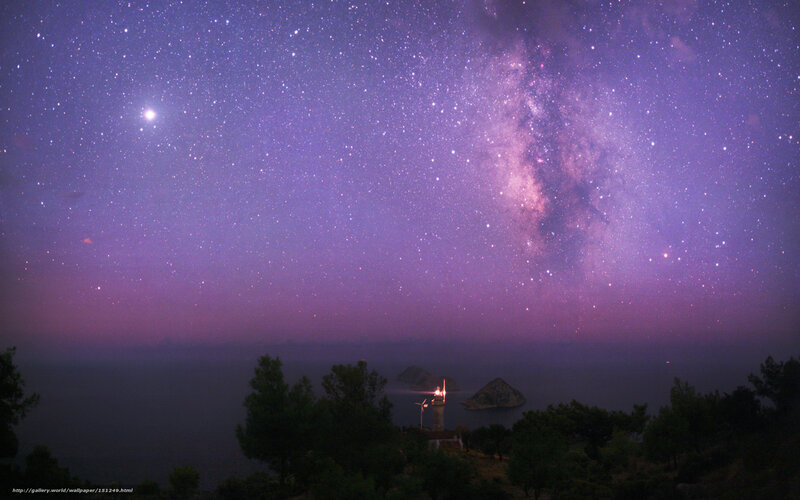 Milky Way over coastal lighthouse