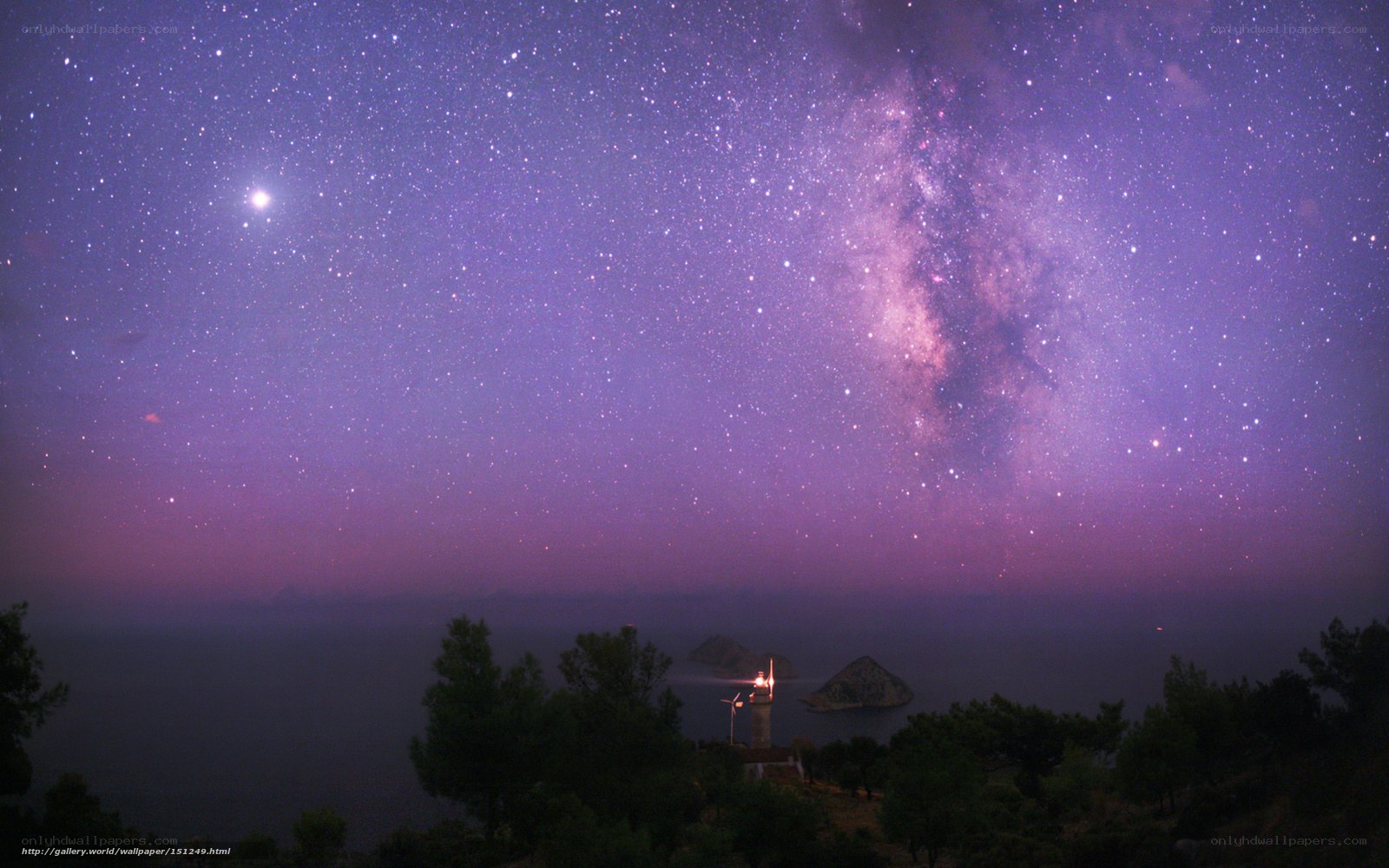 Milky Way over coastal lighthouse