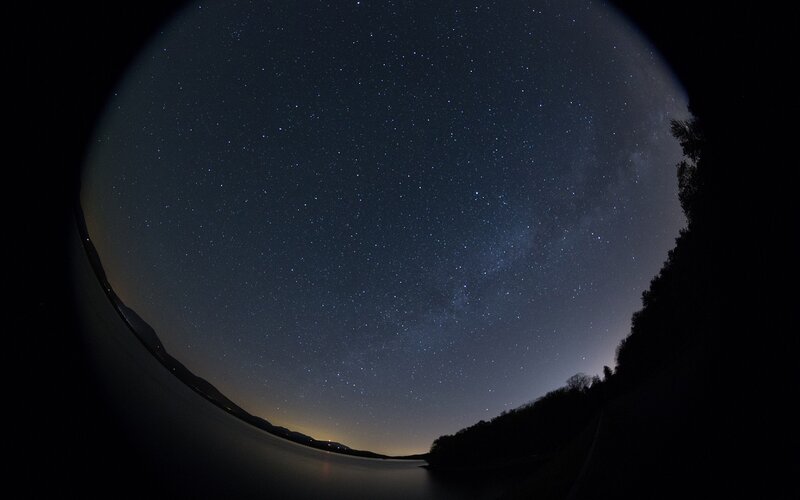 Milky Way over Lake — Black, Serene, Night, Photograph, Stars, Trees, Blue