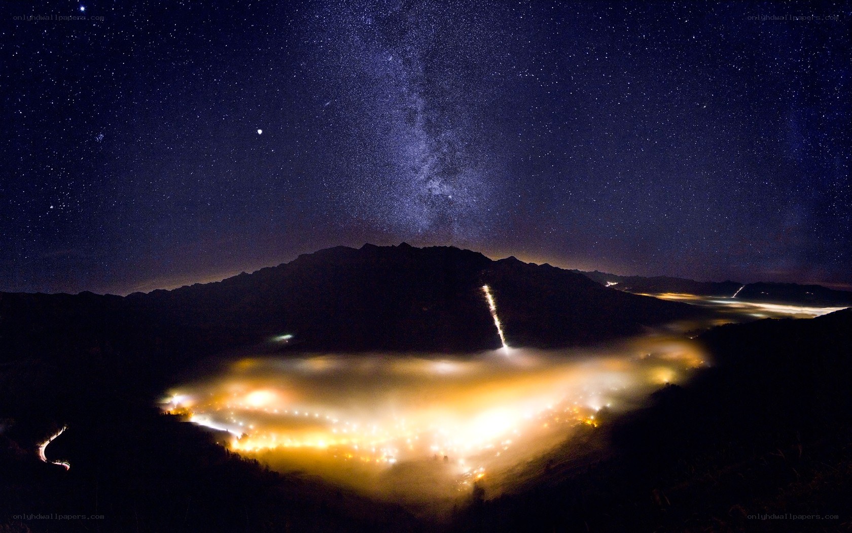 Milky Way over mountain valley