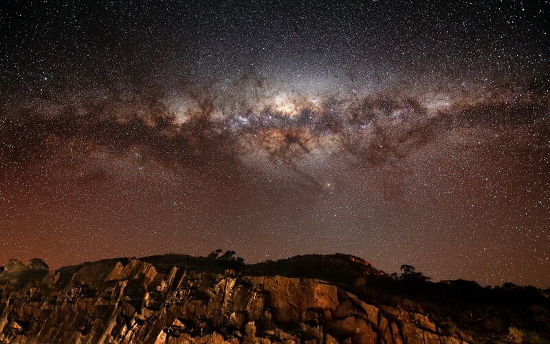 Milky Way over rocky landscape