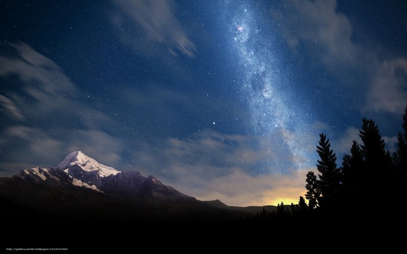 Milky Way over snow-capped mountain