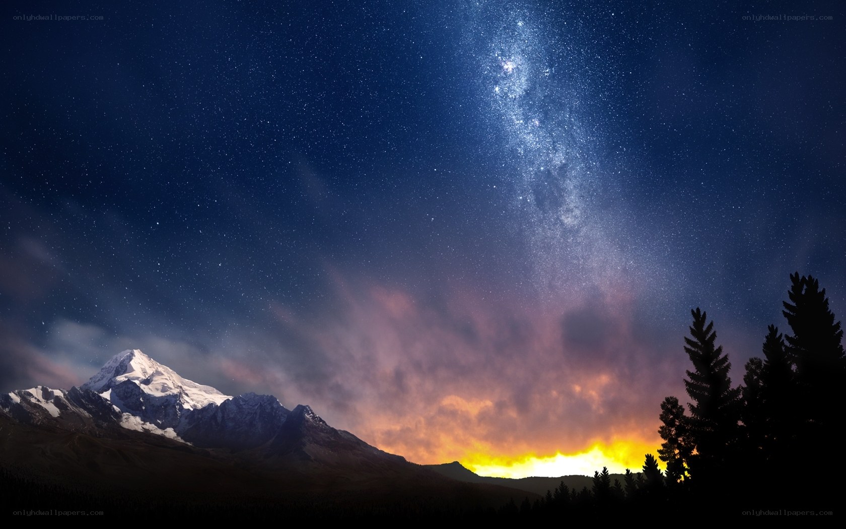 Milky Way over snow-capped mountain