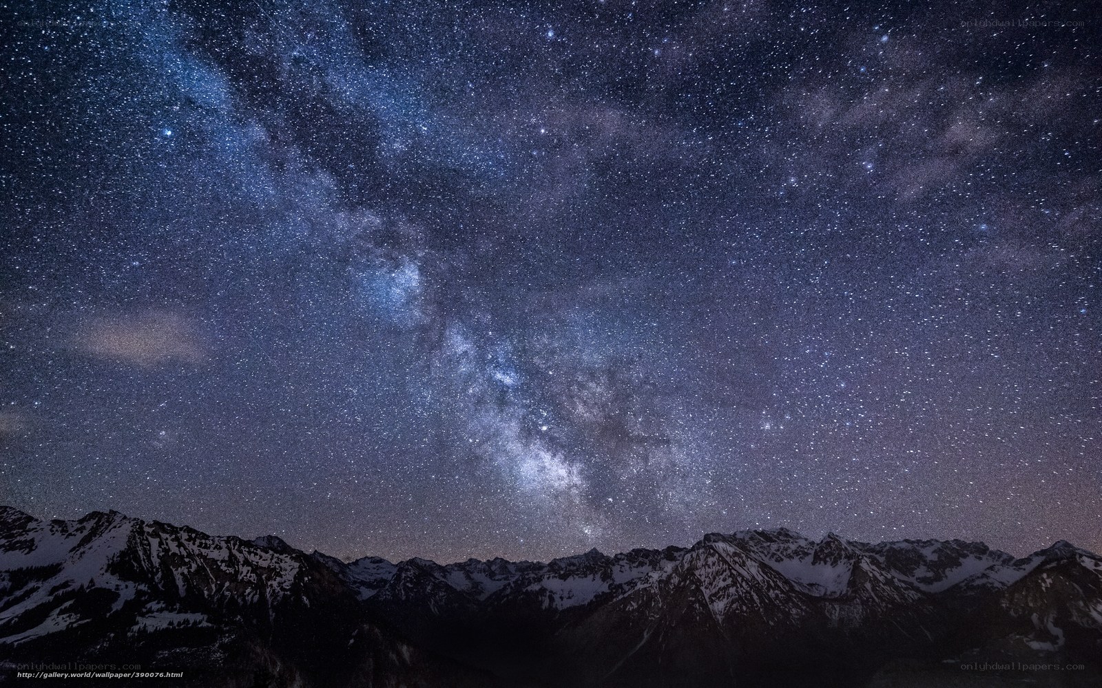 Milky Way over snow-capped mountains