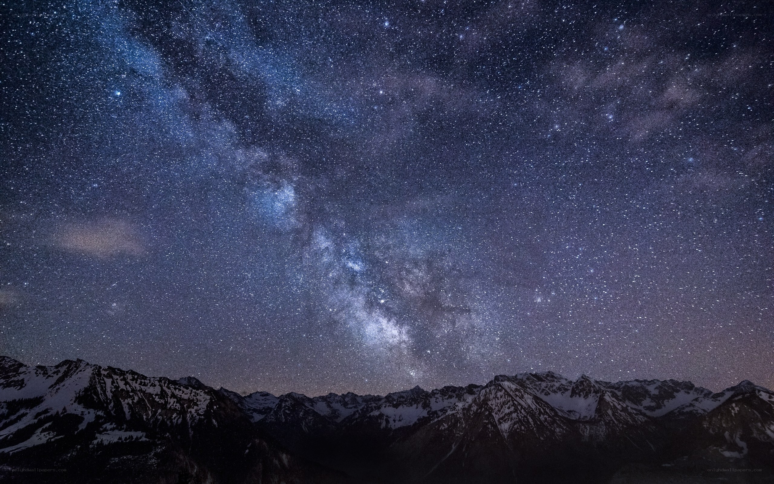Milky Way over snow-capped mountains
