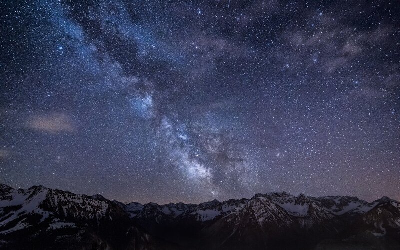 Milky Way over snowy mountains
