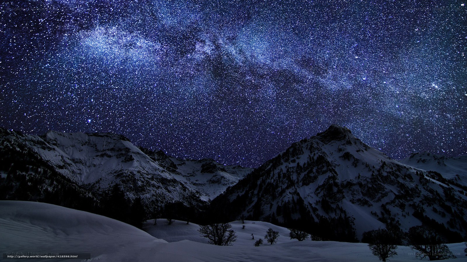 Milky Way over snowy mountains