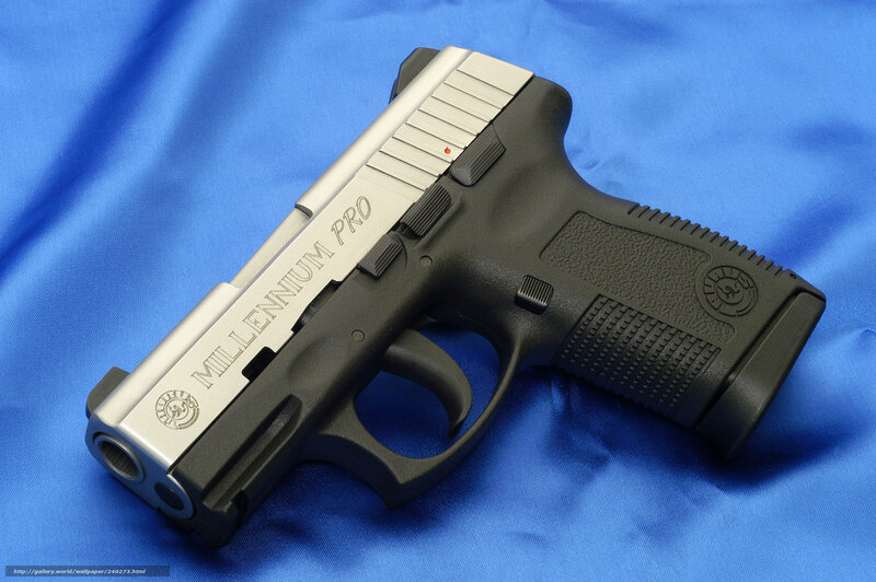 Millennium Pro pistol on blue cloth