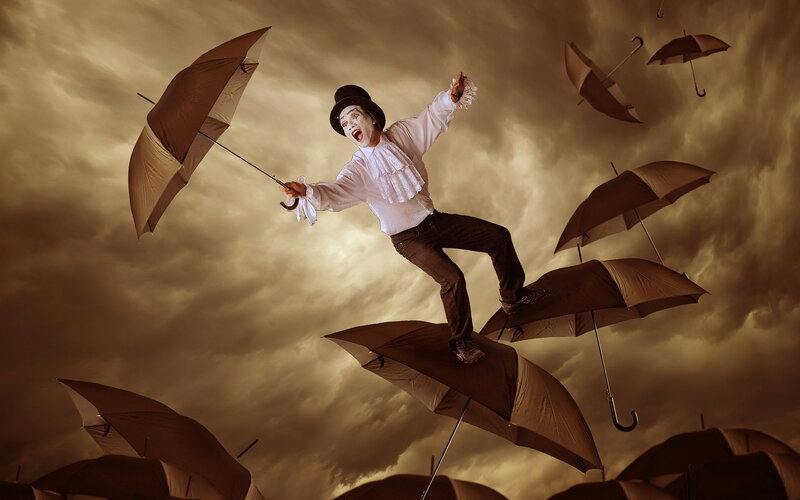 Mime on Umbrellas
