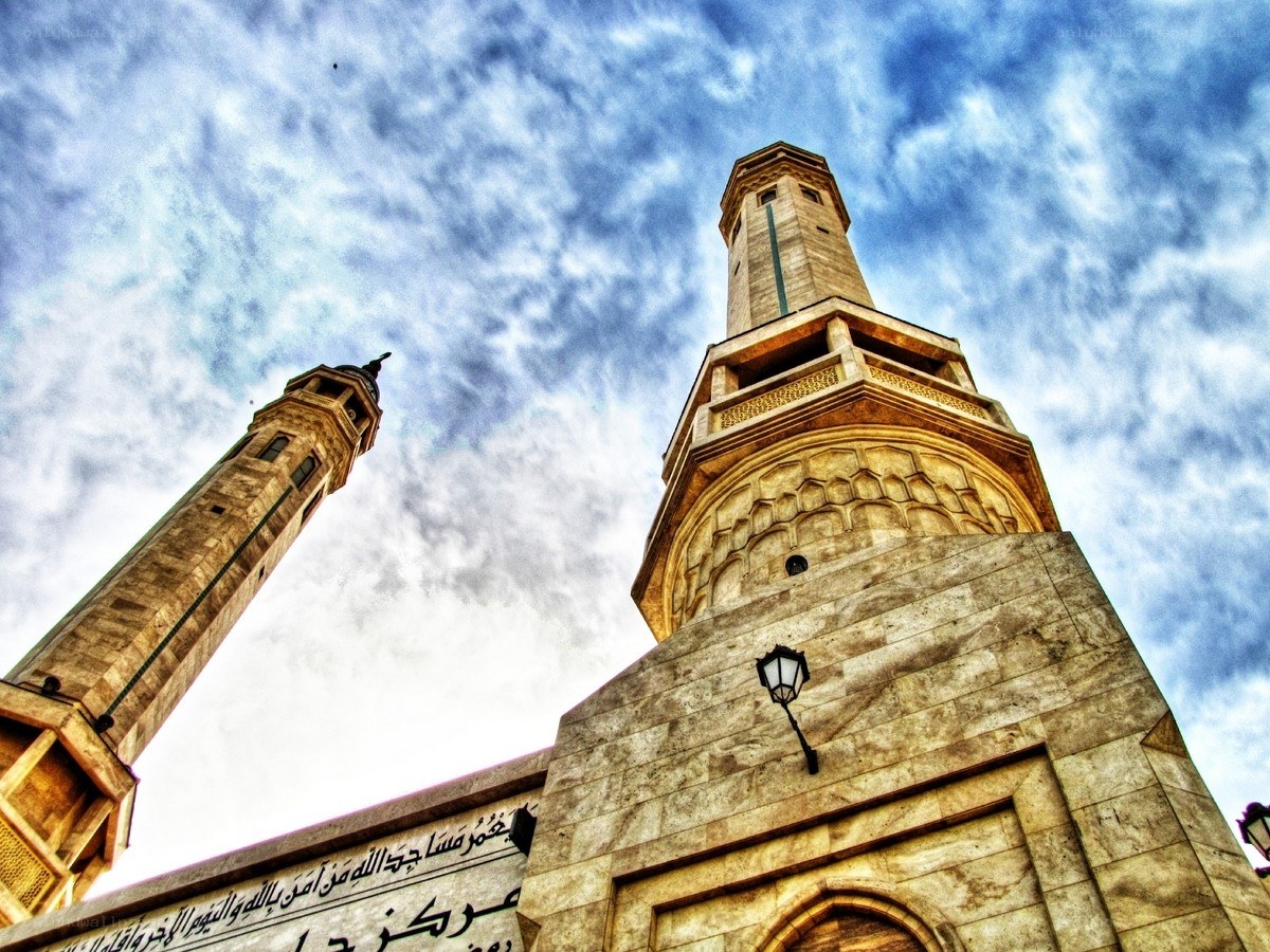 Minarets against a cloudy sky