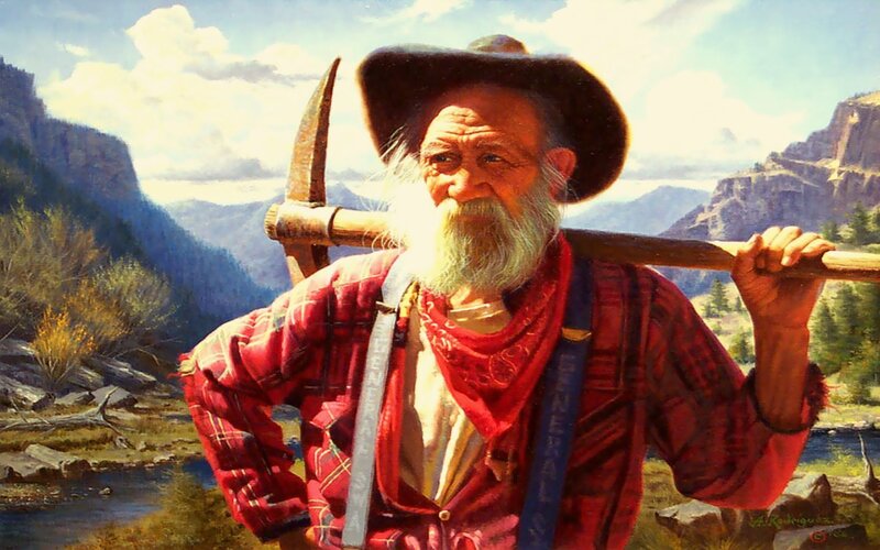 miner with pickaxe in mountains