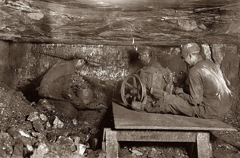 Miners at work underground