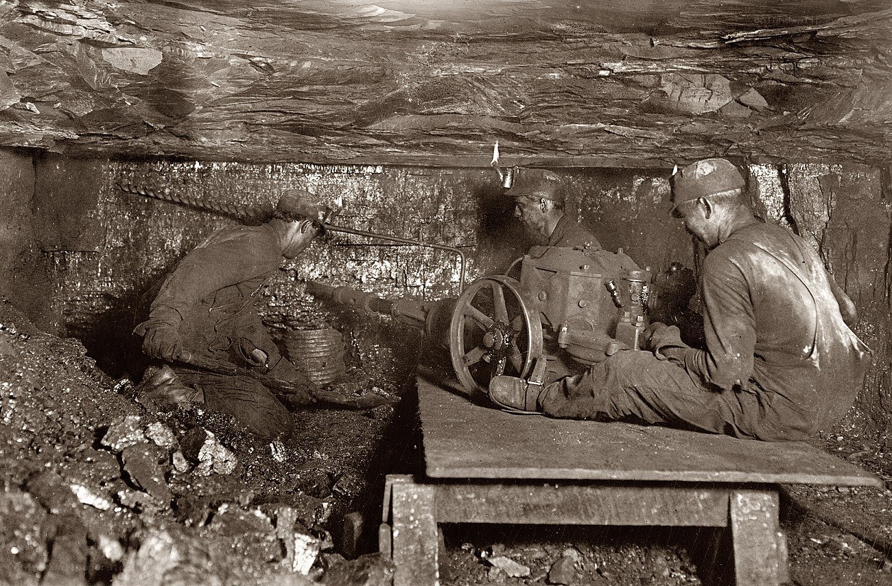 Miners at work underground