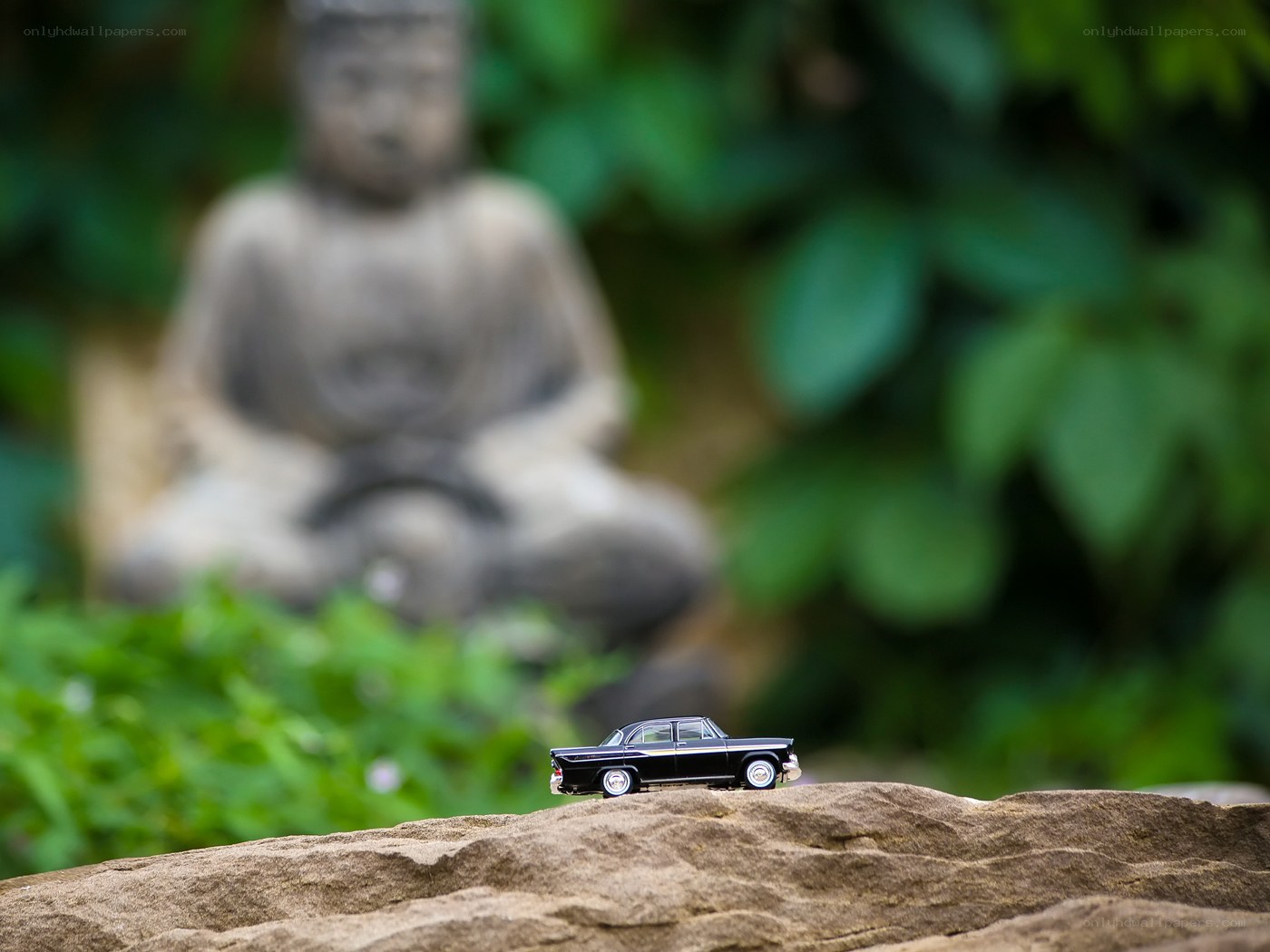 Mini car on a rock