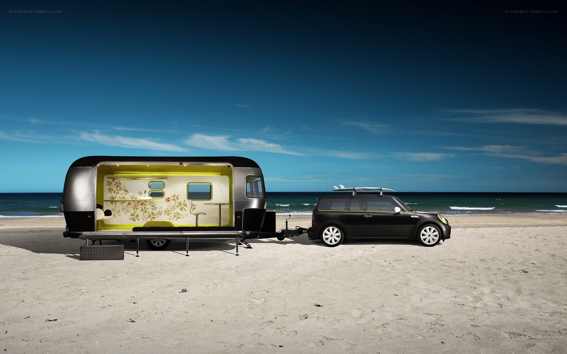 Mini car with trailer on beach