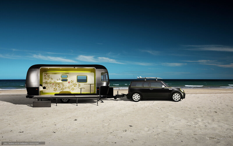 Mini car with trailer on beach