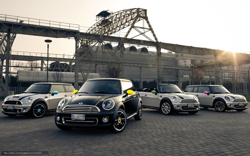 Mini Cooper cars in industrial setting