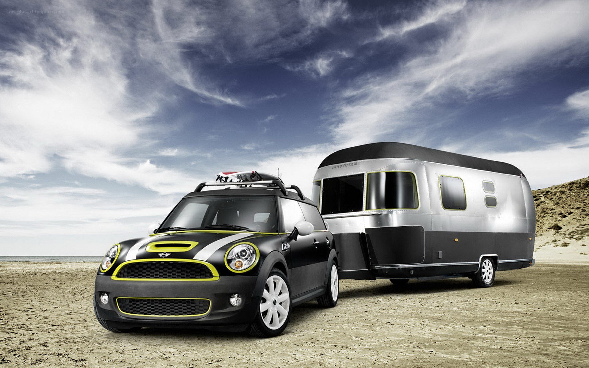 Mini Cooper towing Airstream trailer