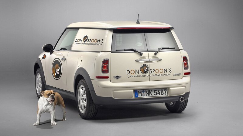 Mini Cooper with dog grooming branding