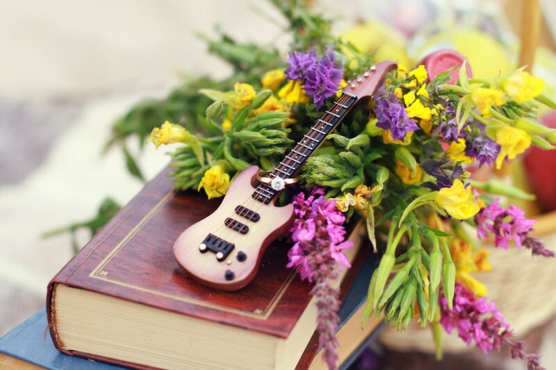 Mini Guitar on Book