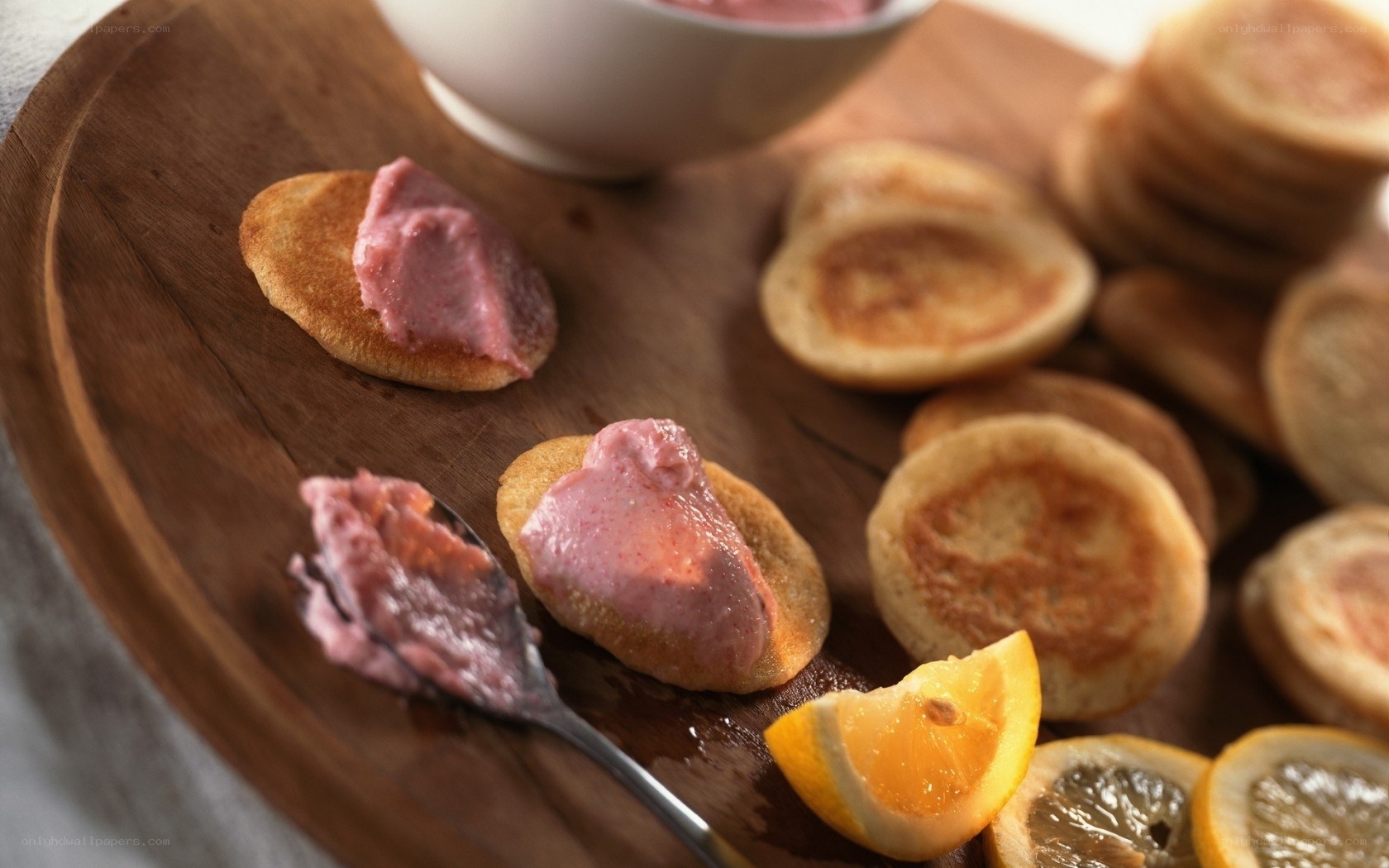 Mini pancakes with pink spread