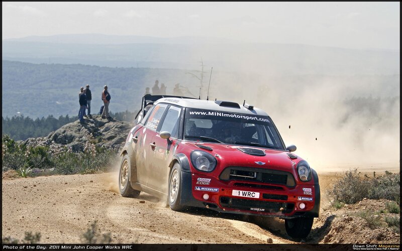 Mini rally car on dirt road