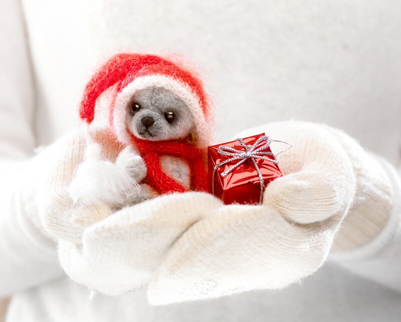 Miniature Bear Holding Gift