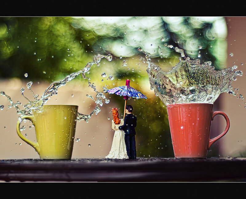 Miniature Couple under Umbrella