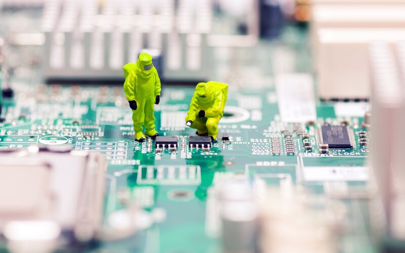 Miniature Figures on Circuit Board