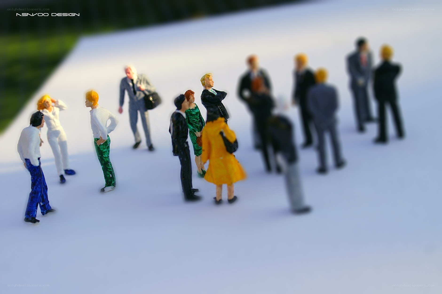 Miniature figures on white surface