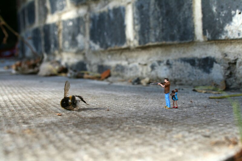 Miniature figures with bee