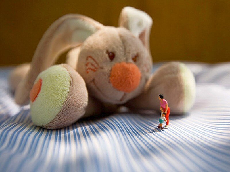 Miniature figures with stuffed rabbit